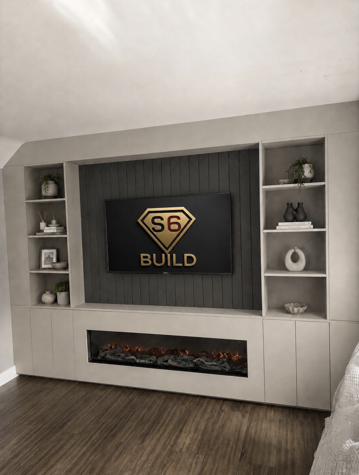 Fitted media wall with open shelving, lower storage and a long electric fire