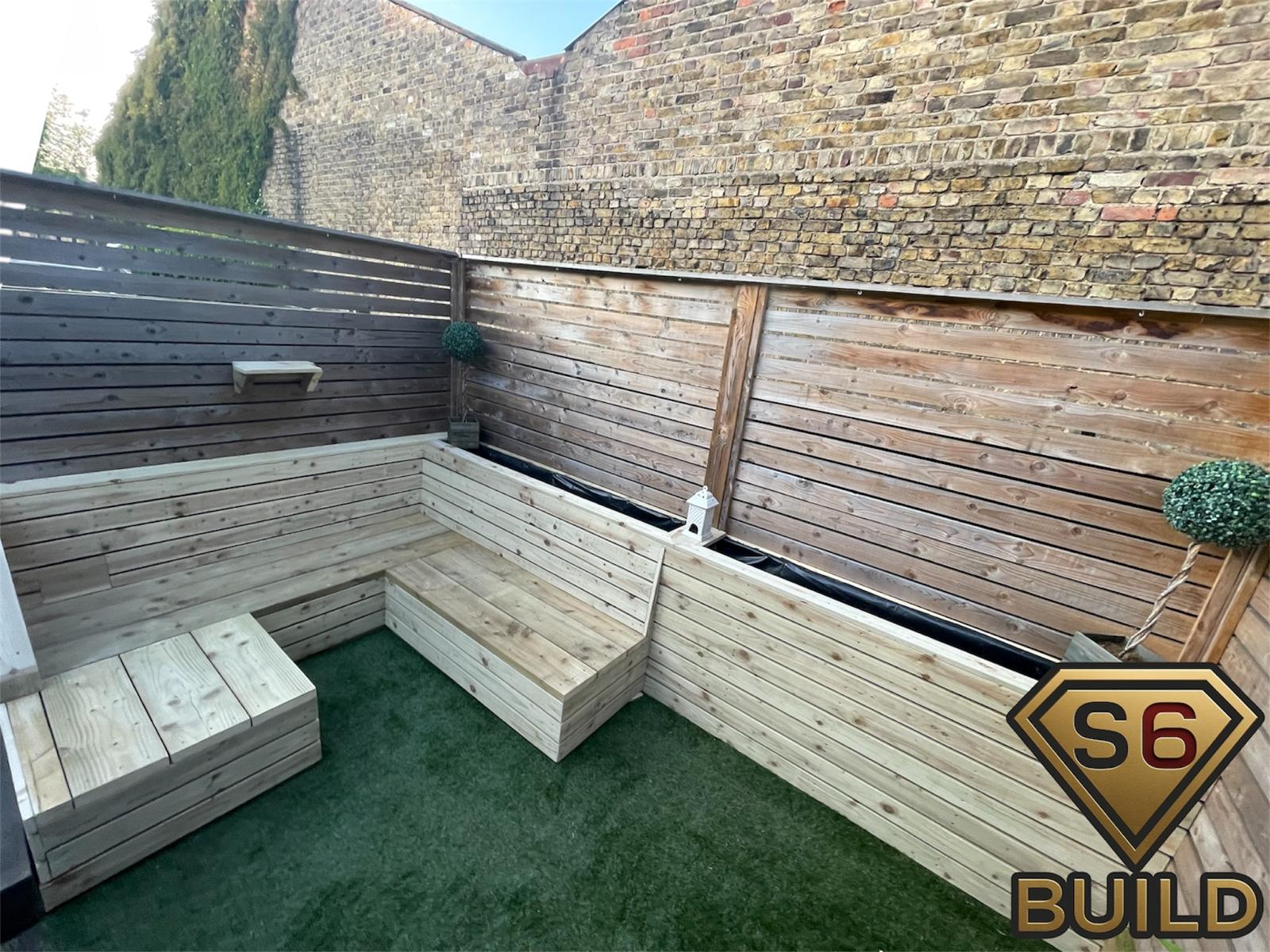 Second view of the built-in timber garden seating and privacy screens